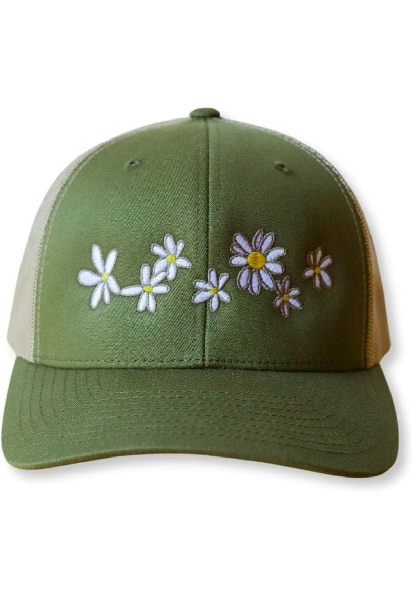 Trucker hat with a low profile. Front bill and panel is a sage green soft cotton fabric with embroidered white daisies. The back panel is khaki mesh with a snapback closure.
